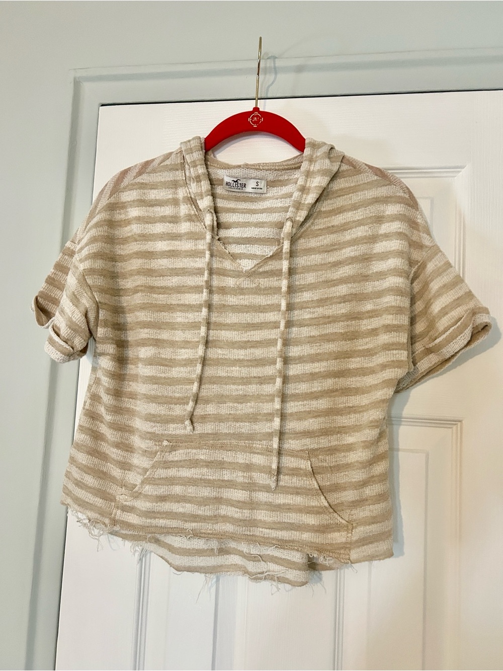 Hollister tan / ivory striped short sleeve hoodie with raw edge hem